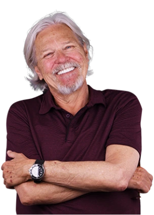 Smiling senior patient with a healthy, natural-looking smile after treatment at Paradise Dentistry Cabo.