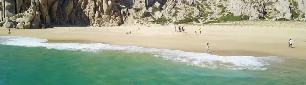 Beautiful beach with golden sand and turquoise waters, offering a peaceful and perfect environment for rest during your recovery.