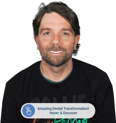 Senior patient smiling after a successful dental transformation at Paradise Dentistry Cabo, showcasing natural-looking smile restoration.